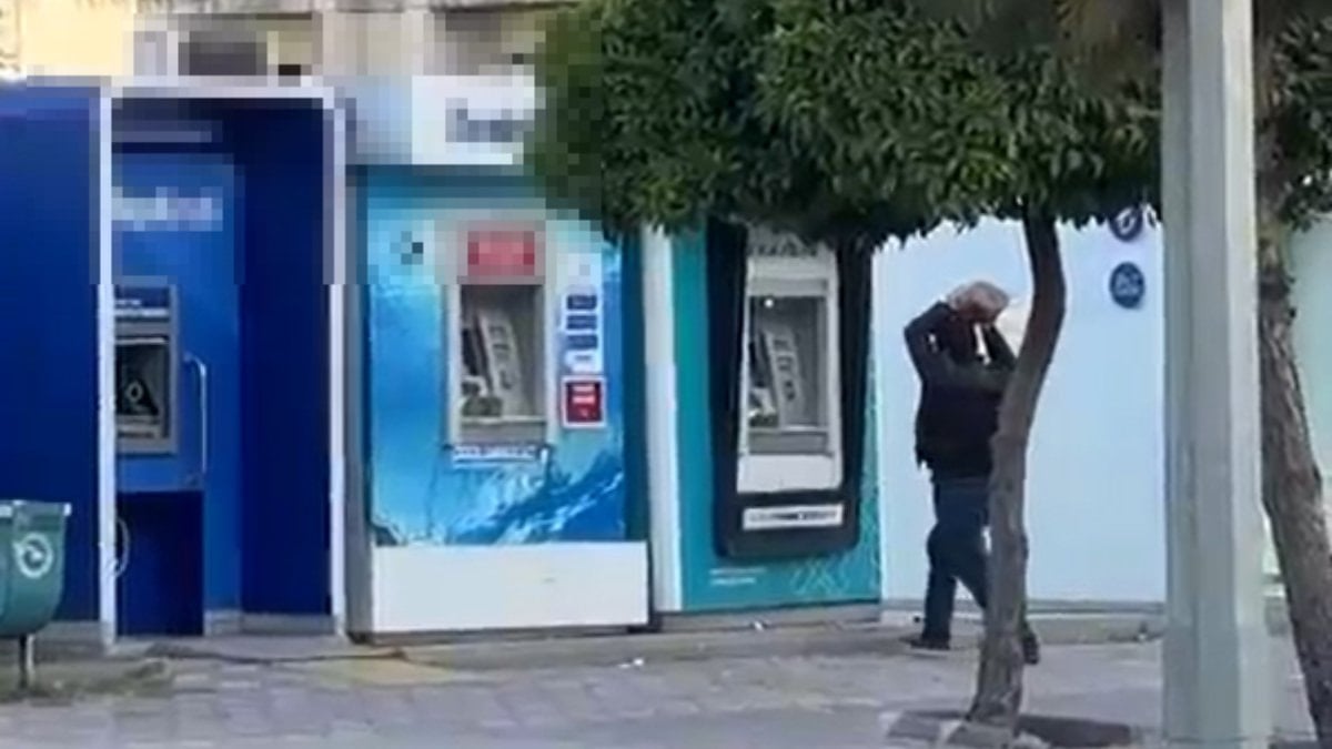 Adana'da taşla ATM parçalayan şahıs gözaltına alındı